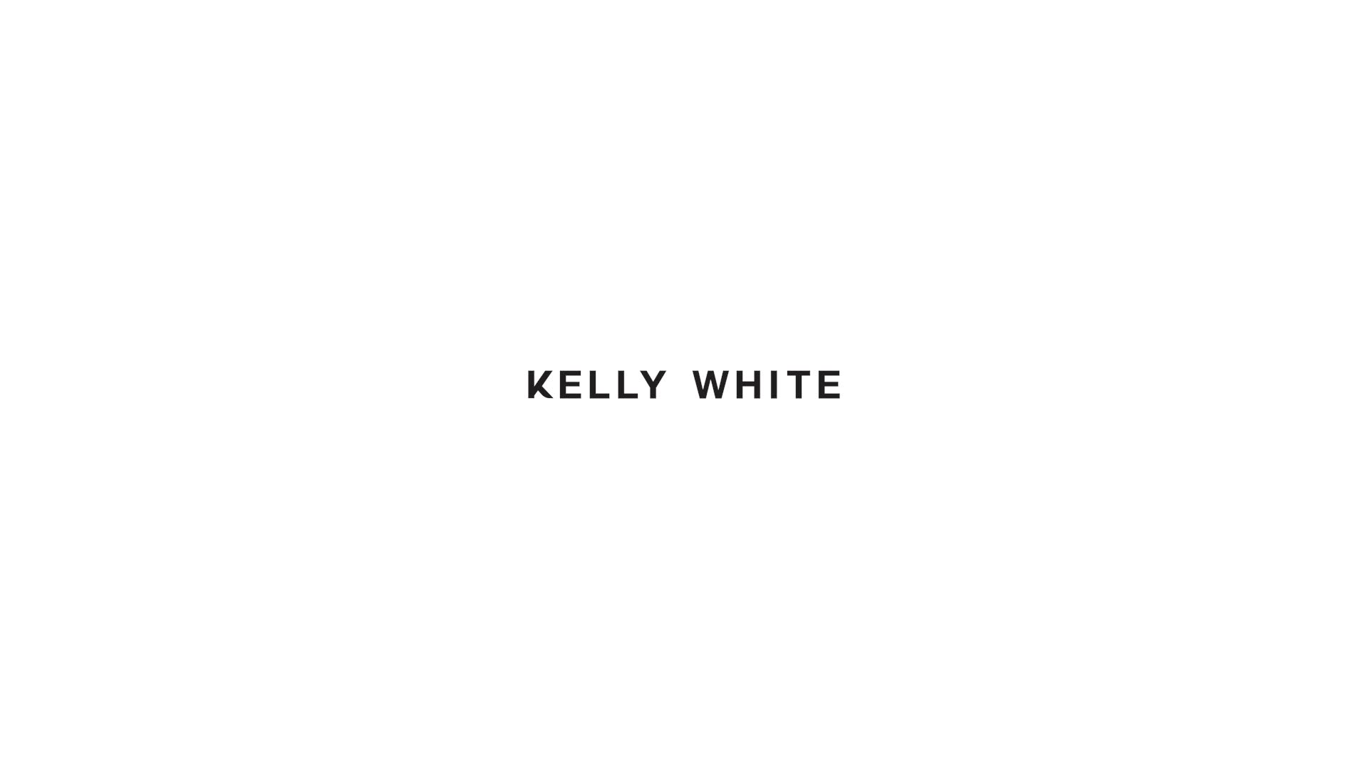 Kelly White wordmark on a white background.